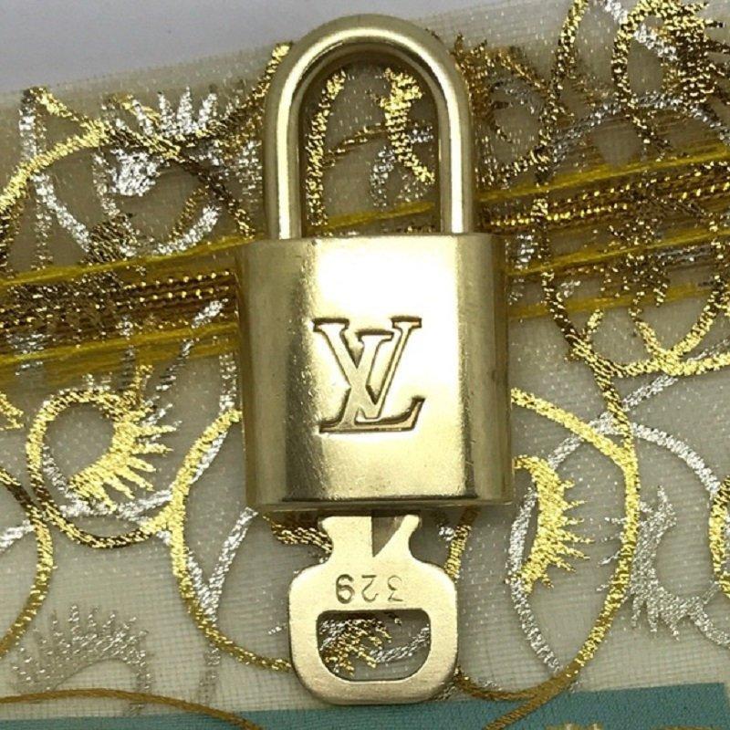 Louis Vuitton, Jewelry, Authentic Lv Lock And Key With Chain