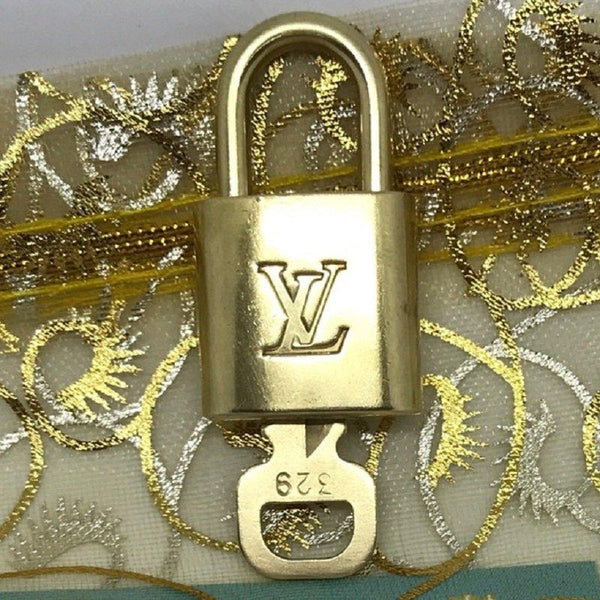 Louis Vuitton lock, 2 keys, dust bag