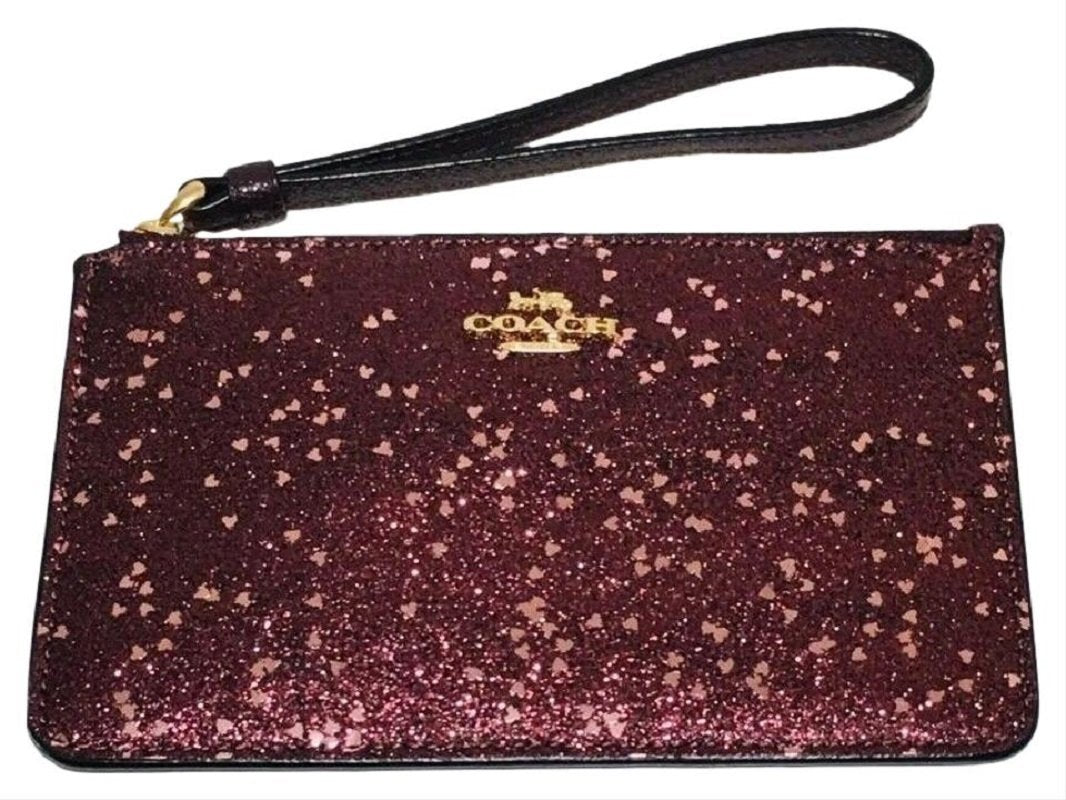 Small back Coach purse with sparkly Coach tag