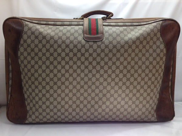 Gucci Supreme Monogram GG Suitcase Trunk Gucci Web GG Suitcase Trunk – Just  Gorgeous Studio