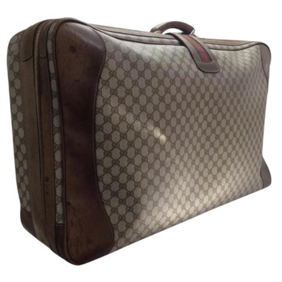 Gucci Supreme Monogram GG Suitcase Trunk Gucci Web GG Suitcase Trunk – Just  Gorgeous Studio