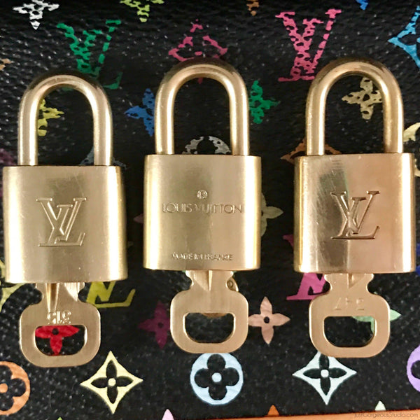 Louis Vuitton Gray Kiwi and Red Whale Rubber Lock Covers and Lock