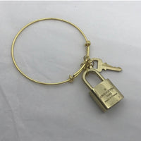 Louis Vuitton Lock Set + Bracelet-Lock & Key, Key Holders, Luggage Tags-Louis Vuitton-1980’s/Gold Tone Bangle-Brass-JustGorgeousStudio.com