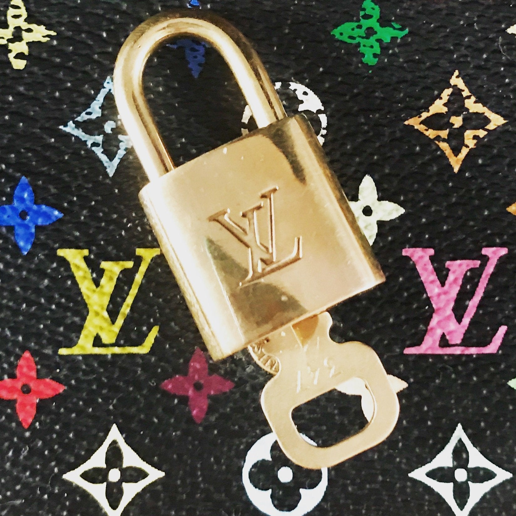 Louis Vuitton, Jewelry, Authentic Louis Vuitton Lock And Key Bracelet