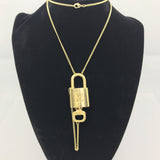 Louis Vuitton Lock Set On Necklace-Jewelry, Watches, & Sunglasses-Louis Vuitton-Brass/Gold-JustGorgeousStudio.com