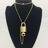 Louis Vuitton Lock Set On Necklace-Jewelry, Watches, & Sunglasses-Louis Vuitton-Brass/Gold-JustGorgeousStudio.com