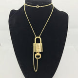 Louis Vuitton Lock Set On Necklace-Jewelry, Watches, & Sunglasses-Louis Vuitton-Brass/Gold-JustGorgeousStudio.com