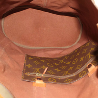 LOT:328  LOUIS VUITTON - a Monogram Randonnee GM backpack.