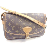 This Vintage LV Sologne is in traditional monogram canvas, brass